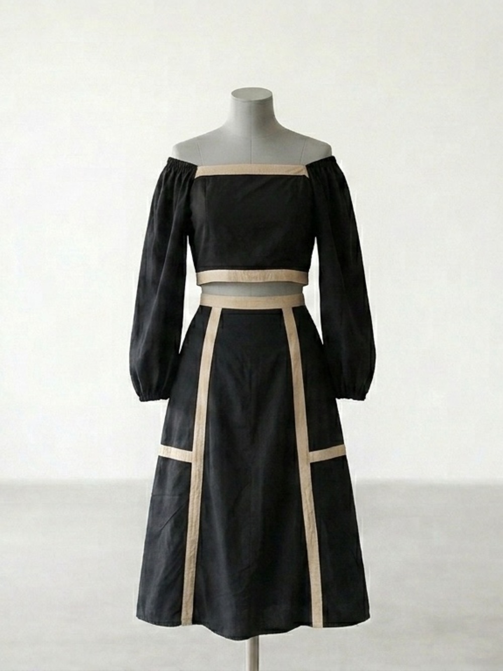 Able Black Off-Shoulder Two-Piece Skirt Set with Beige Trim
